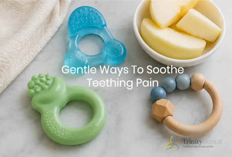 Teething toys and cold foods used to comfort a baby during teething discomfort